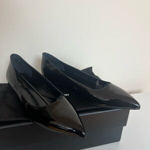 YSL patent leather flats . Brand new in box. Never worn US Size 7